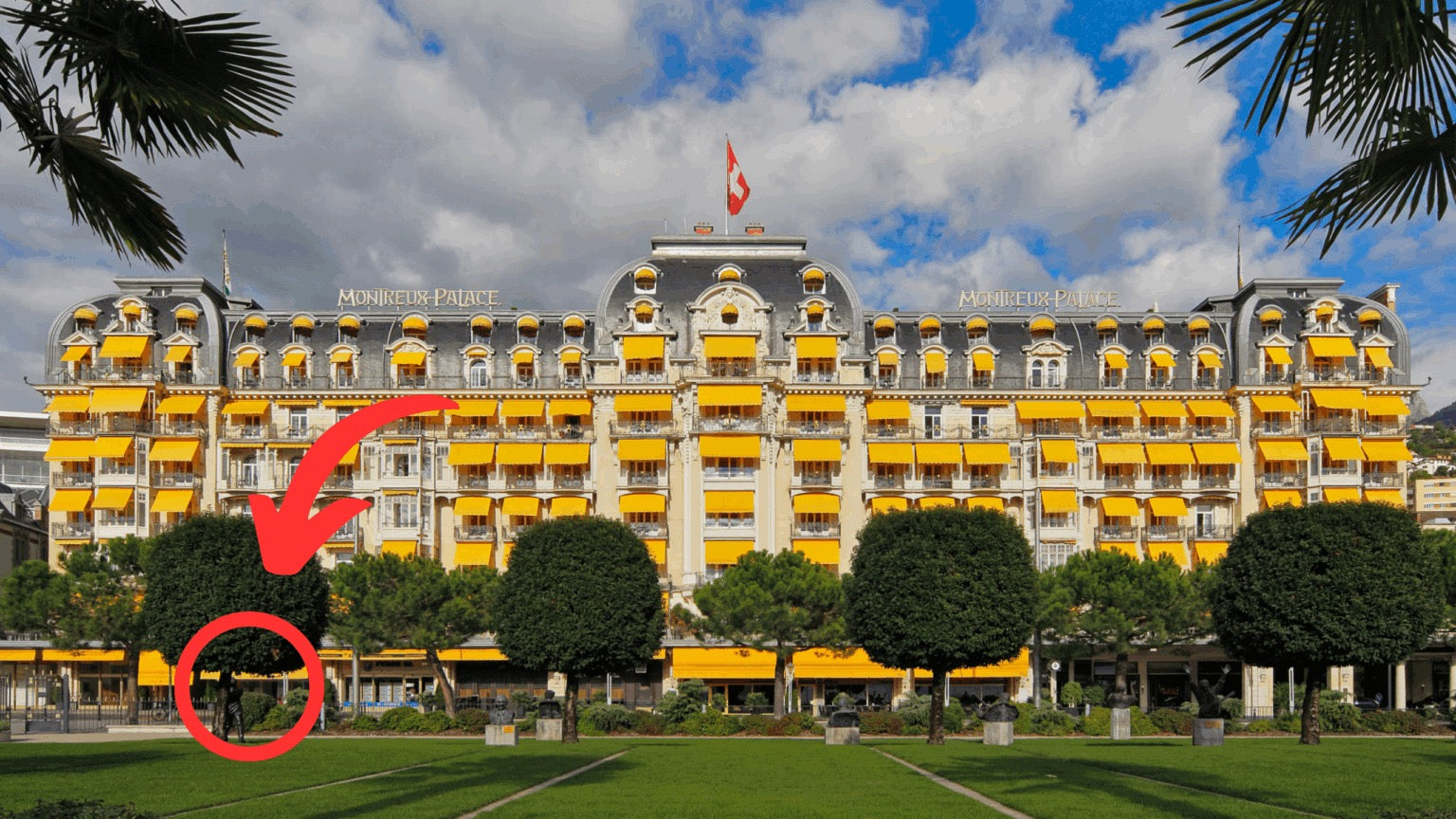 Facade de l'hotel Montreux Palace avec une fleche rouge pointant Bobby and friends